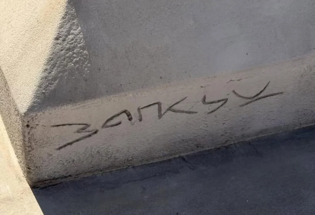 Banksy-scultpure-signature