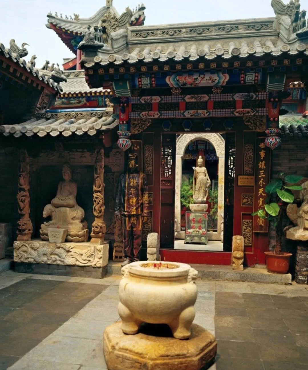 Liu Bolin, widely known as “The Invisible Man,” constructs photographs in which his own body is (1)